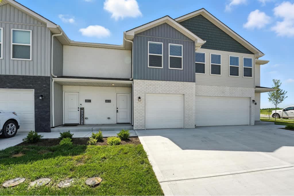 Rustic Heights Townhomes garages and front entries - Oak Grove, MO
