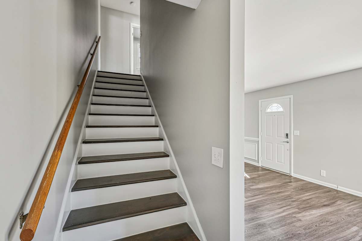 118 30th Ave interior staircase with wood handrails - Nashville, TN