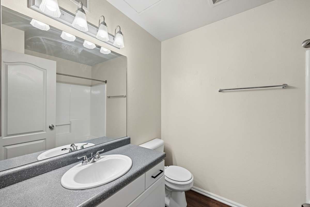 Ardenne Apartments bathroom sink and mirror - Lafayette, CO