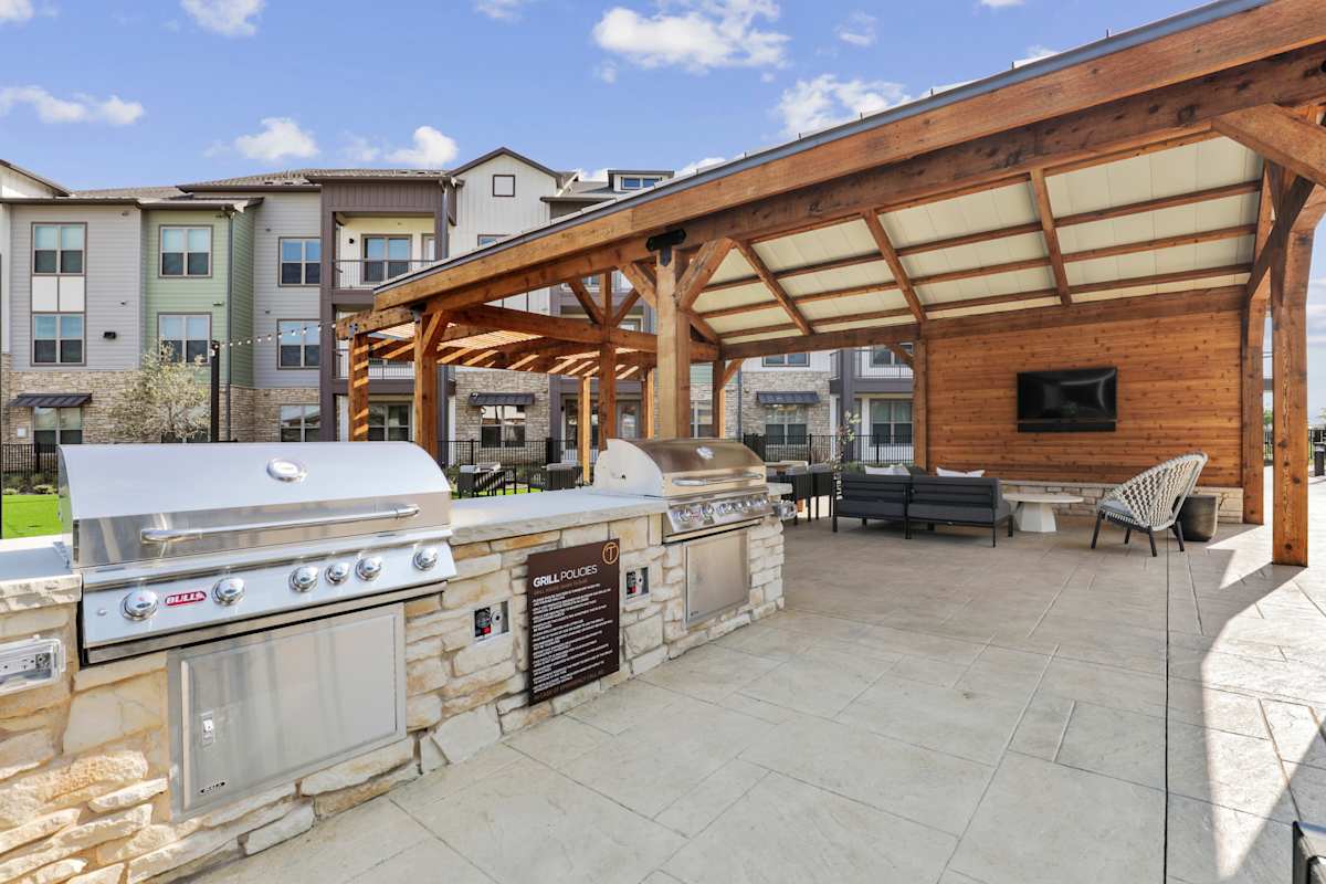 Trailhead at Chisholm Trail Ranch outdoor grilling and dining area - Fort Worth, TX