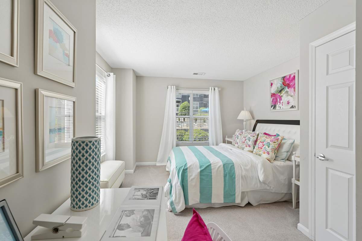 Hyde Park apartment bedroom with wall art - Cary, NC