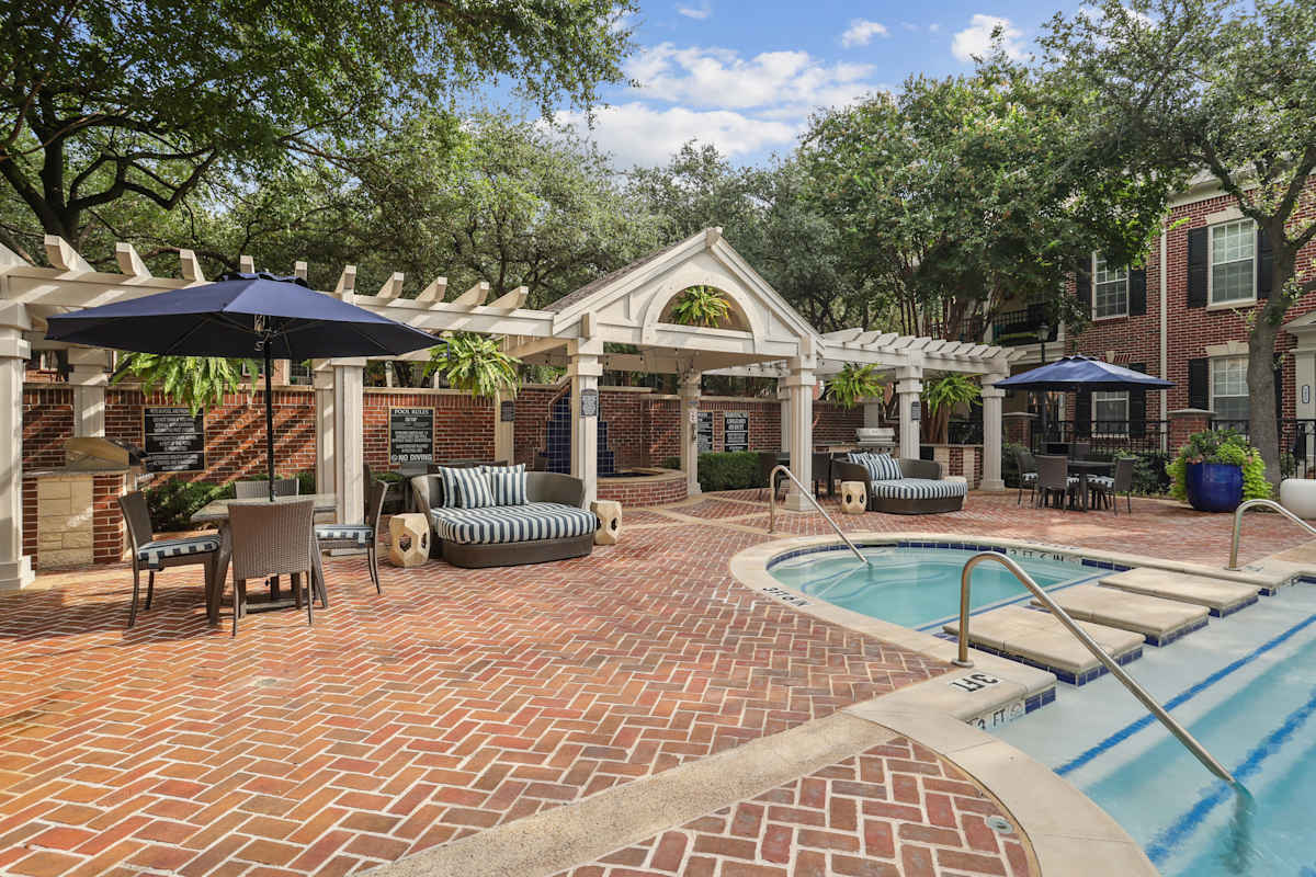 The Caruth Premier Townhome Apartments pool area - Dallas, TX