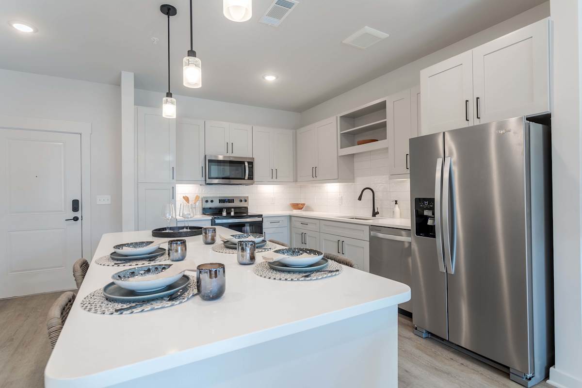 Solstice at June Lake kitchen with island and stainless appliances - Spring Hill, TN