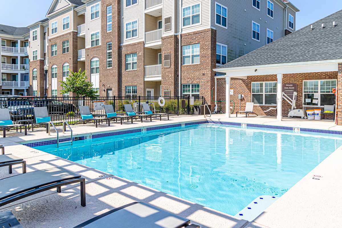 The Pavilion at Raritan pool courtyard with lounge seating - Flemington, NJ