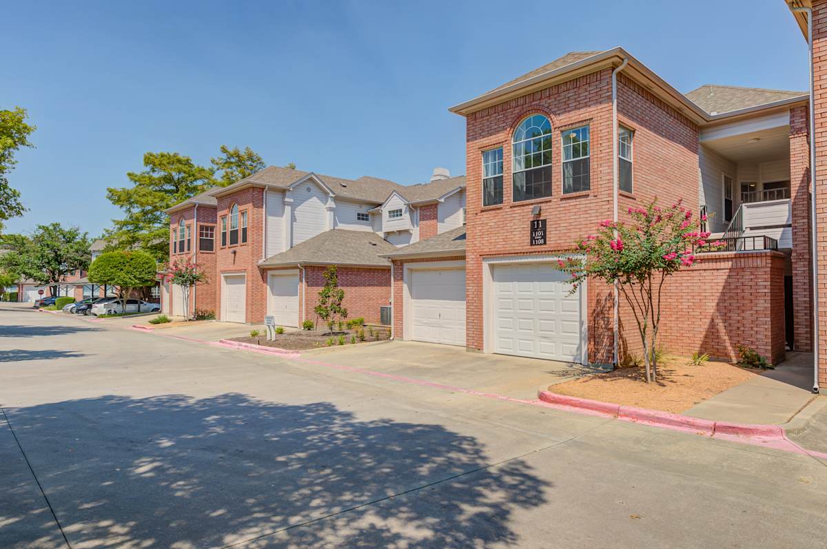 Courts of Bent Tree townhome-style garages and driveways - Dallas, TX