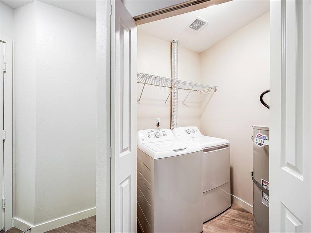 Union Bay Apartments in-home laundry area - Seattle, WA
