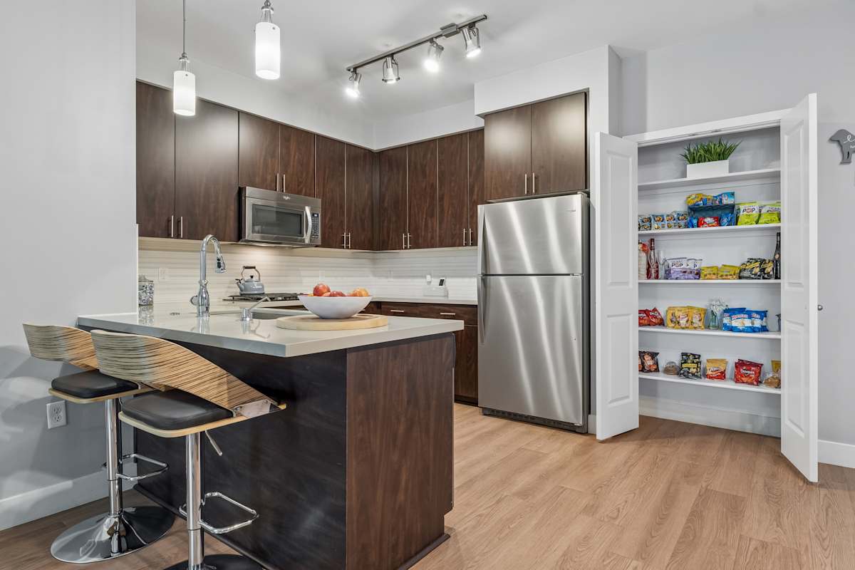 Apartment kitchen — representative home at Biltmore at Camelback.