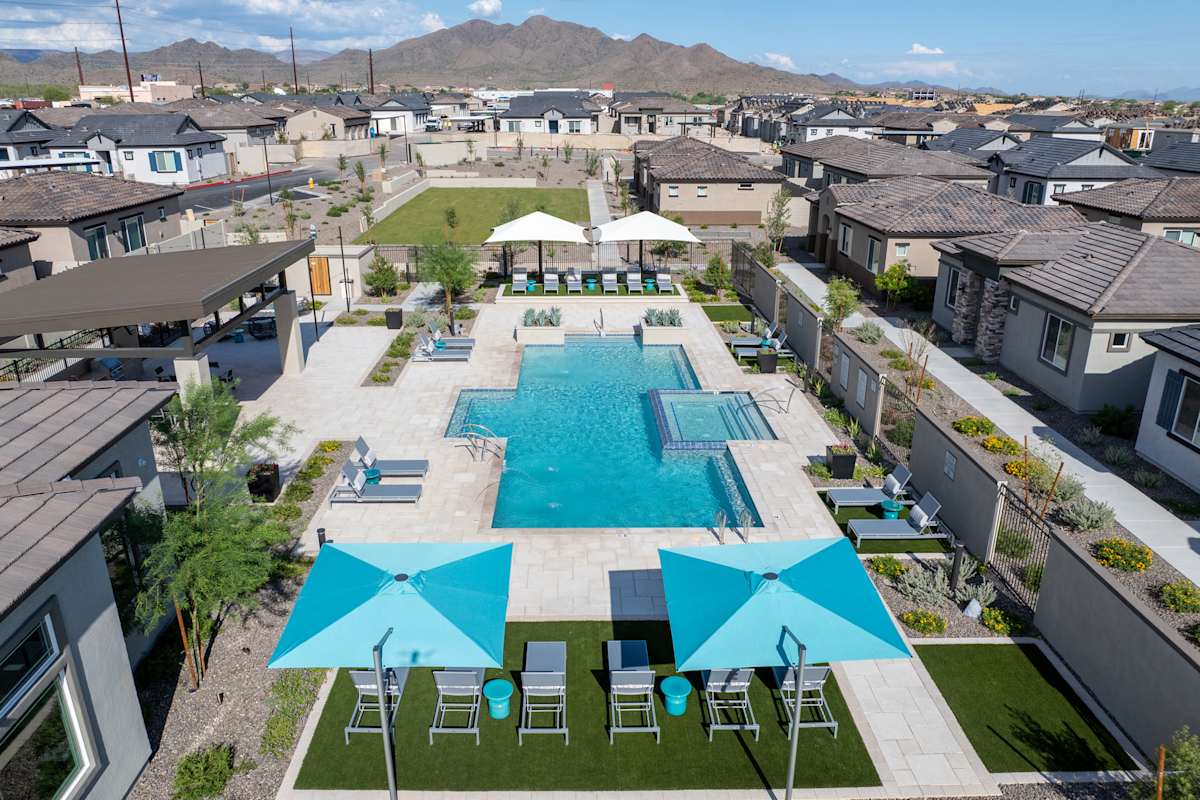 Elevated view of the swimming pool and shaded loungers at Avilla Vista Norte.