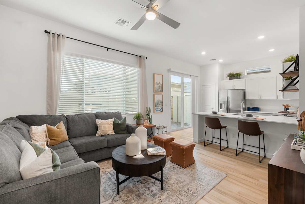 Furnished living room adjoining the kitchen at Avilla Vista Norte.