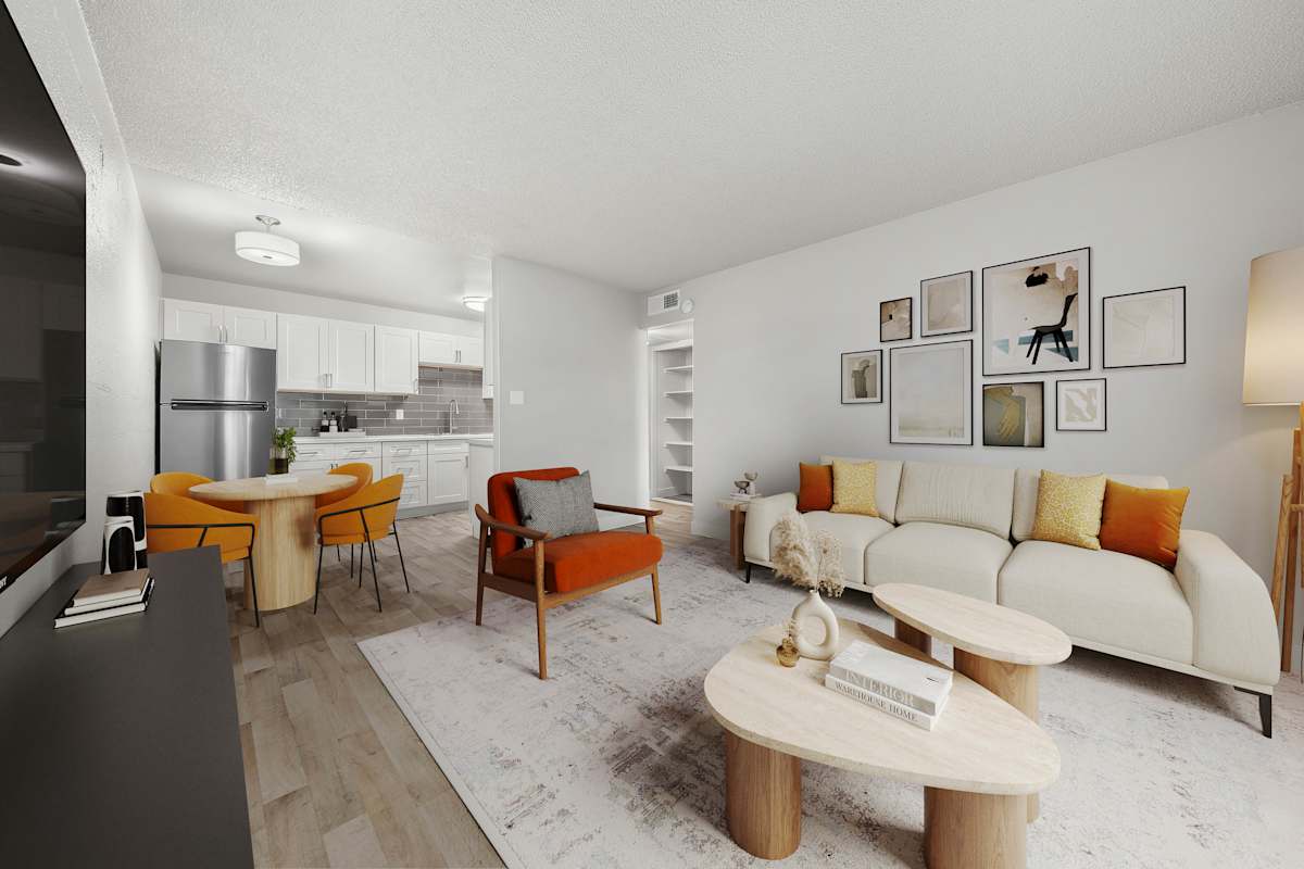 2025 West Apartment Homes living room with sofa and accent chair - Phoenix, AZ