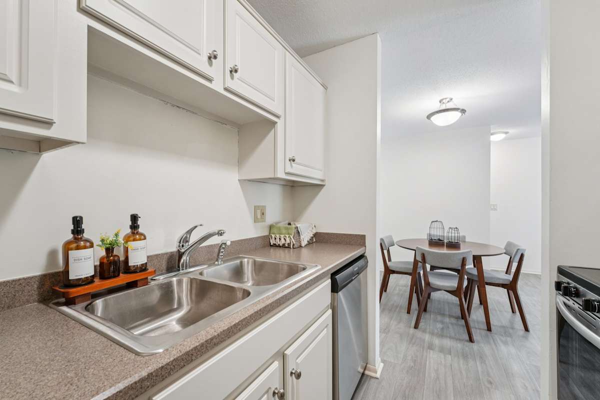 The Bosk Apartment Homes kitchen and dining area - Woodbury, MN