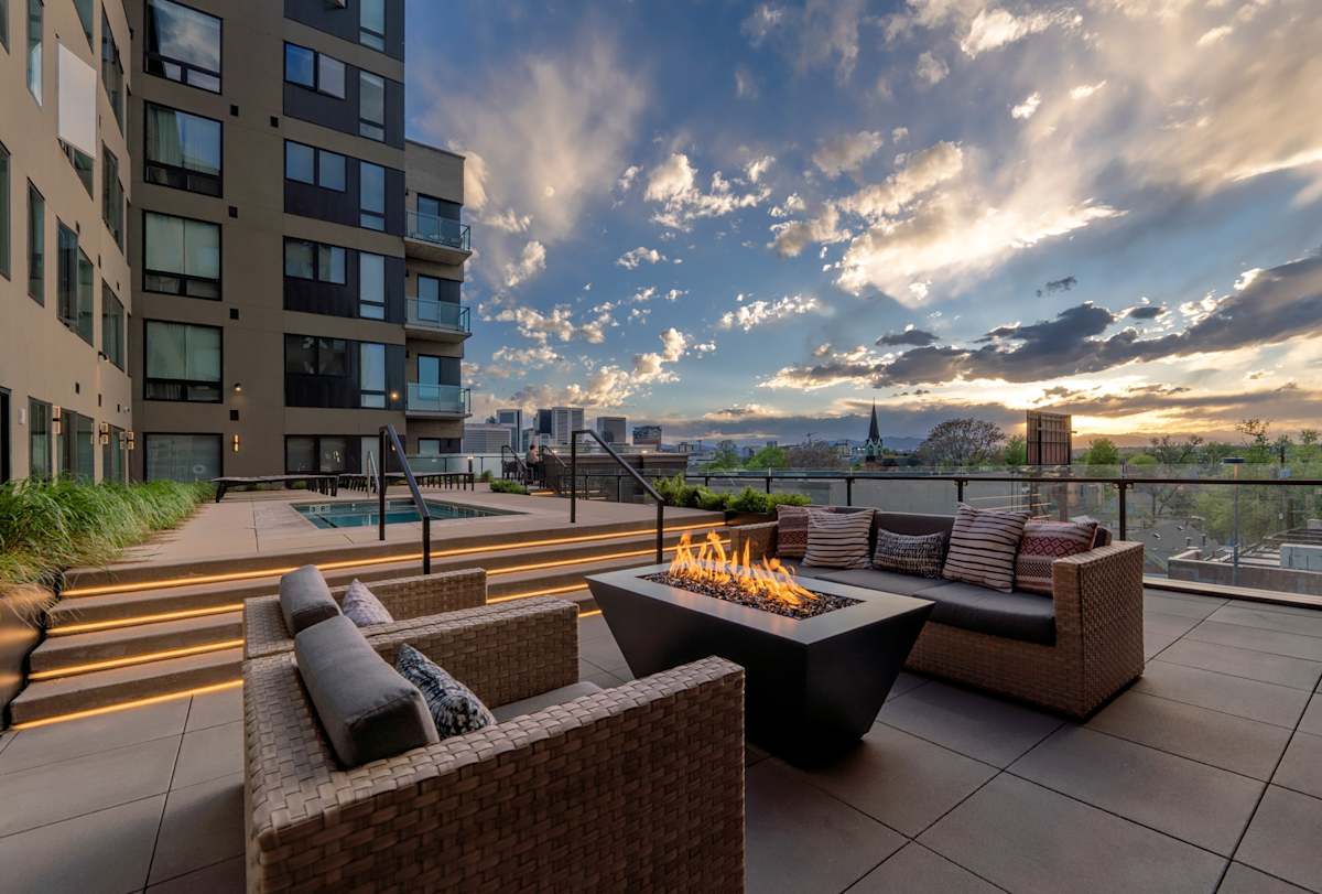 The Lydian rooftop patio with seating and fire pit - Denver, CO