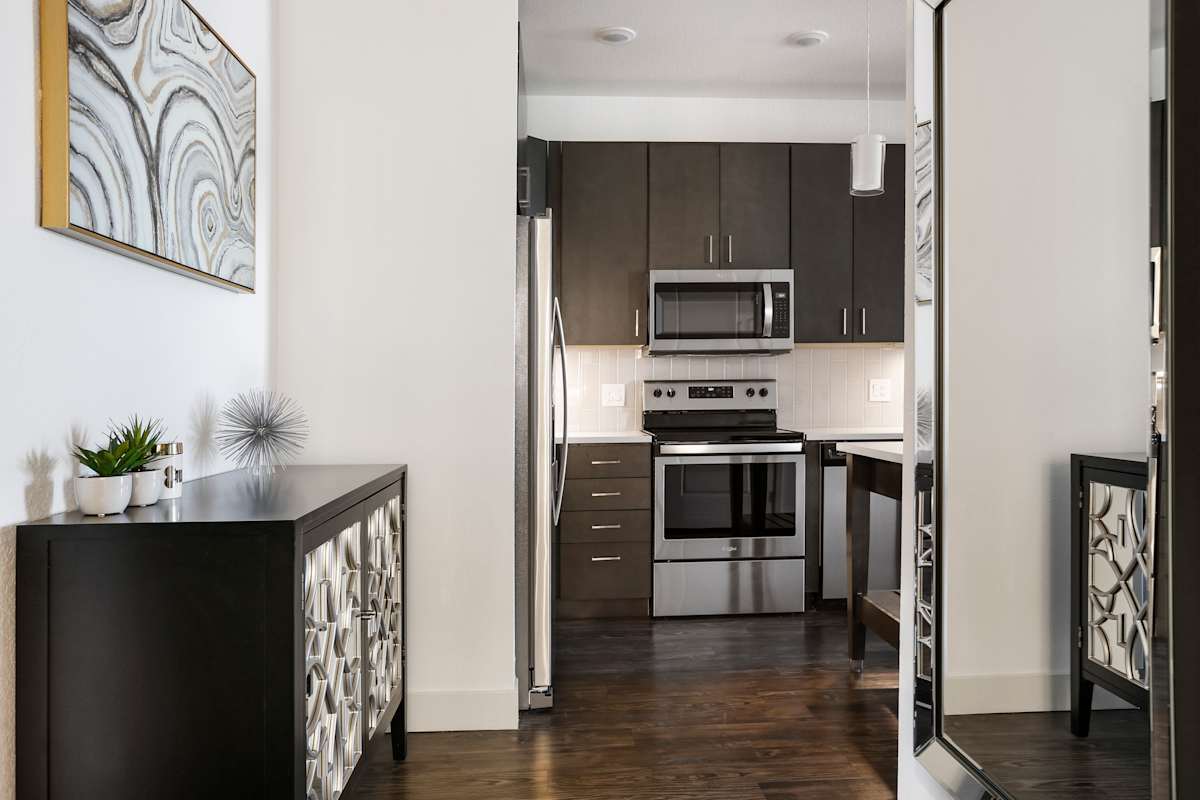 The Lydian kitchen with stainless appliances and cabinets - Denver, CO