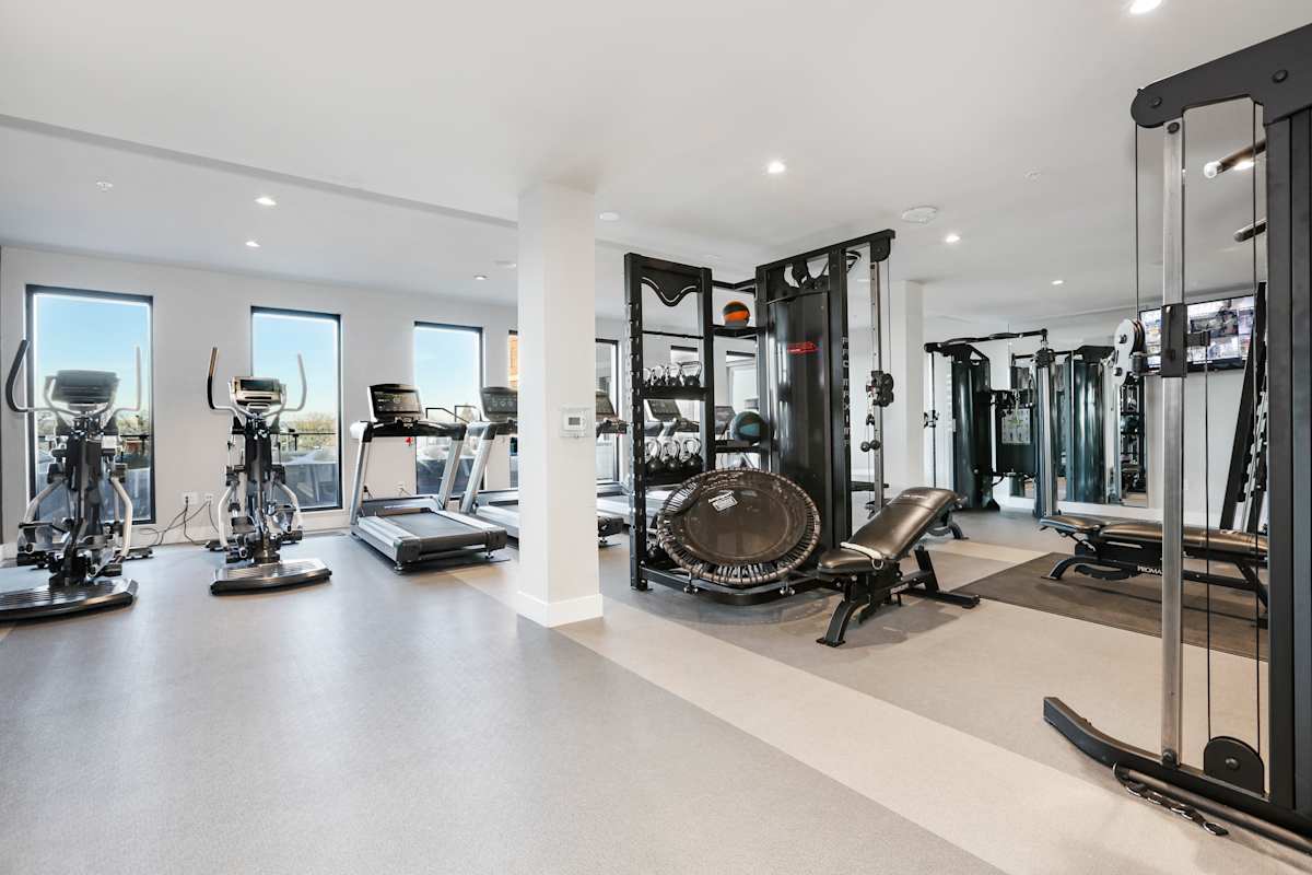 The Lydian fitness center with weights and cardio equipment - Denver, CO