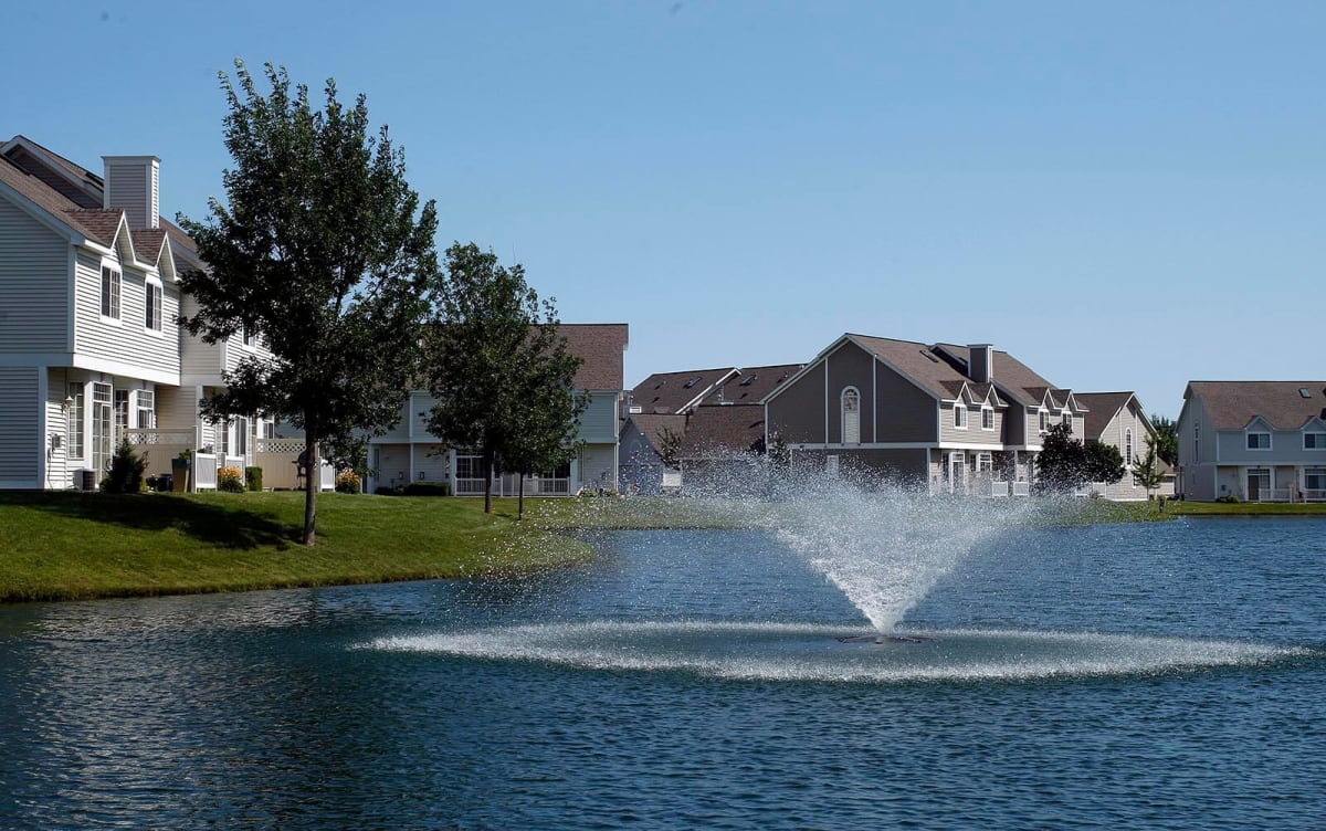 Avalon Cove Townhomes patio view of fountains on the water - Rochester, MN