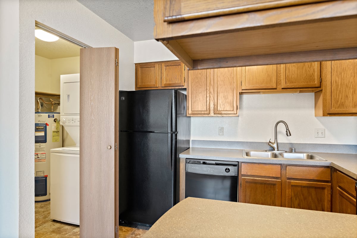 Olympic Village Apartments kitchen cabinetry and appliances - Billings, MT