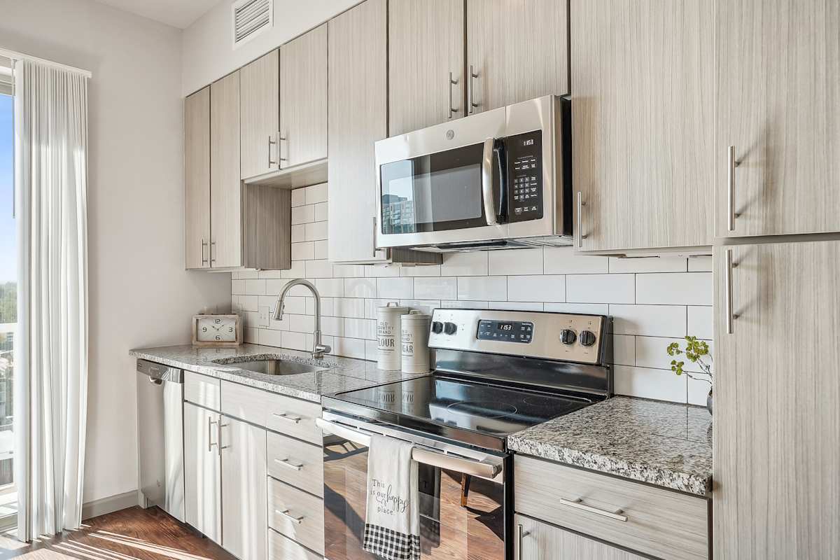 Civic Lofts stainless steel appliances kitchen - Denver, CO