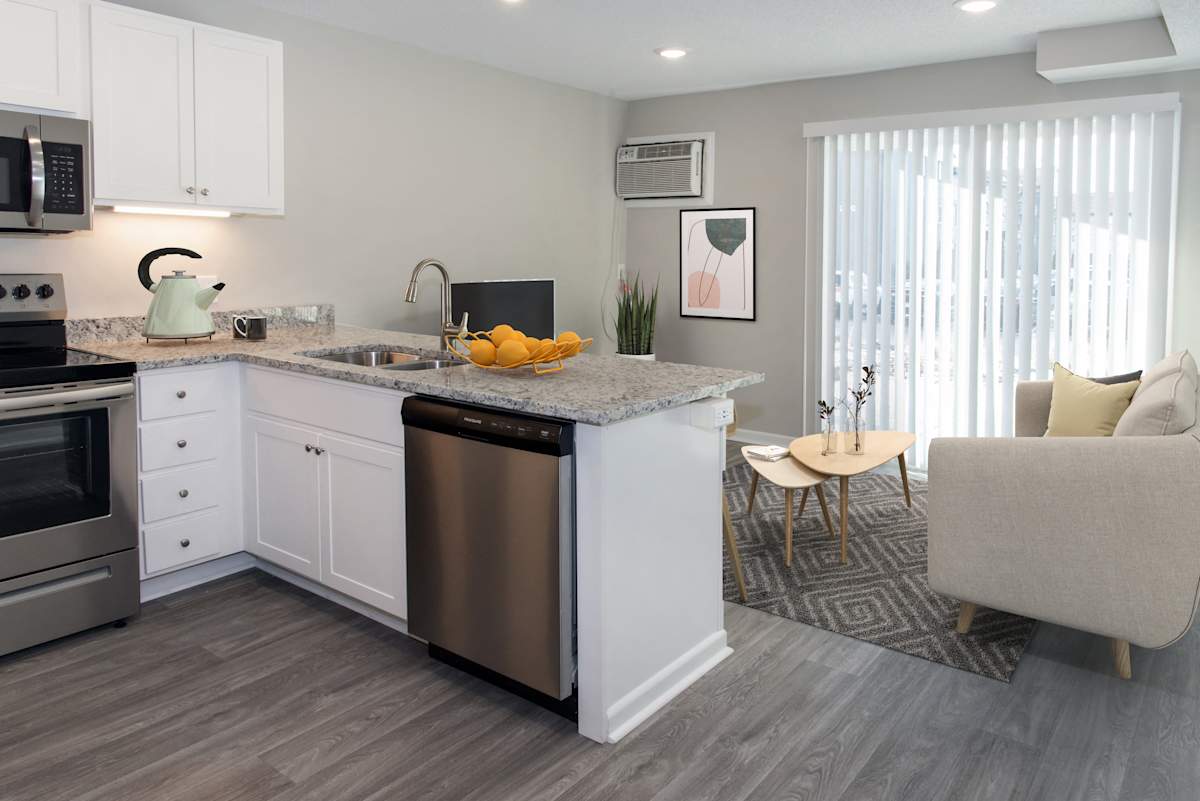 Connelly On Eleven open-concept kitchen and living area - Burnsville, MN