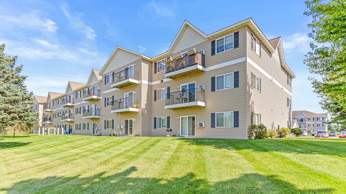 Evergreen Apartment Homes exterior with balconies - Isanti, MN