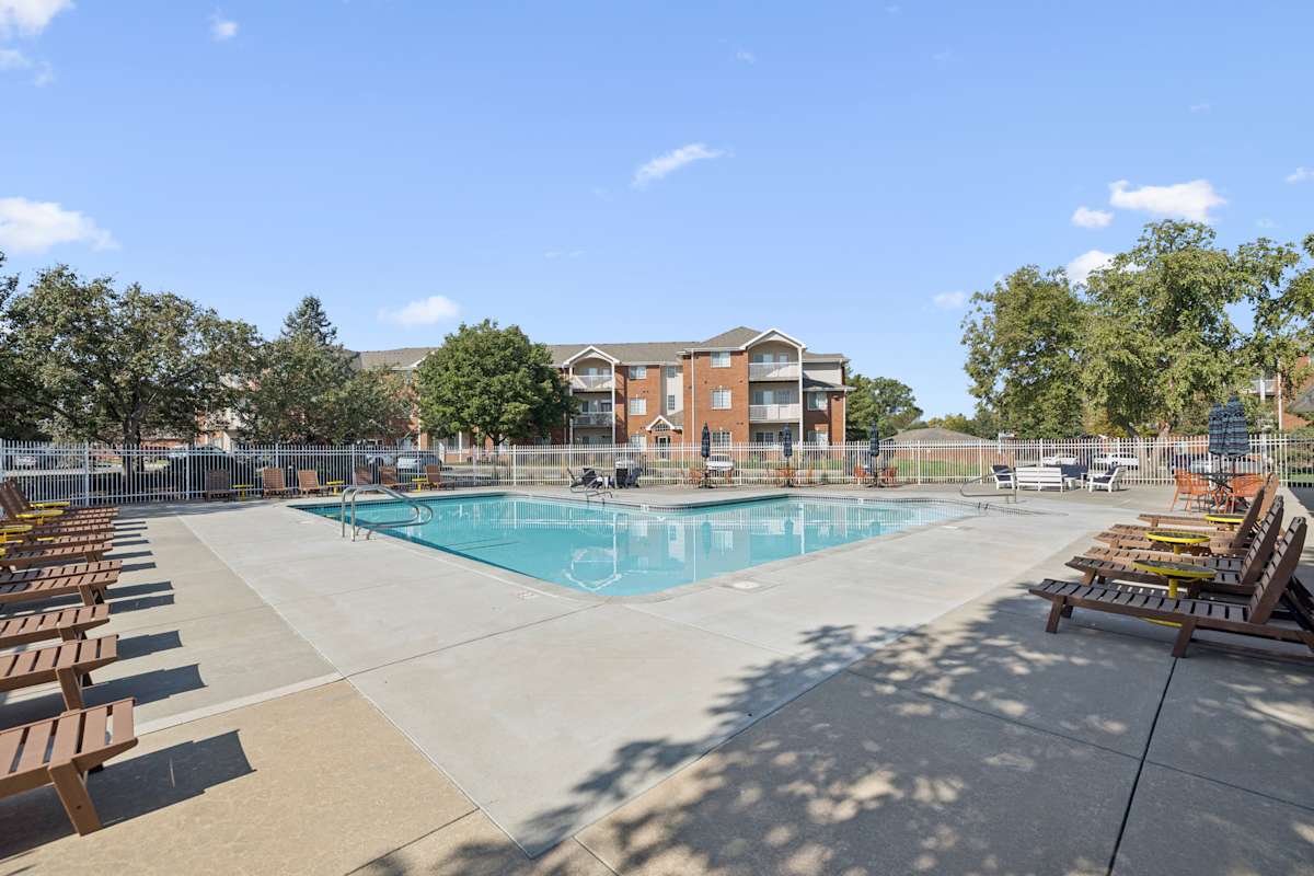 Lakeside Village Apartment Homes outdoor pool with sundeck - Lincoln, NE