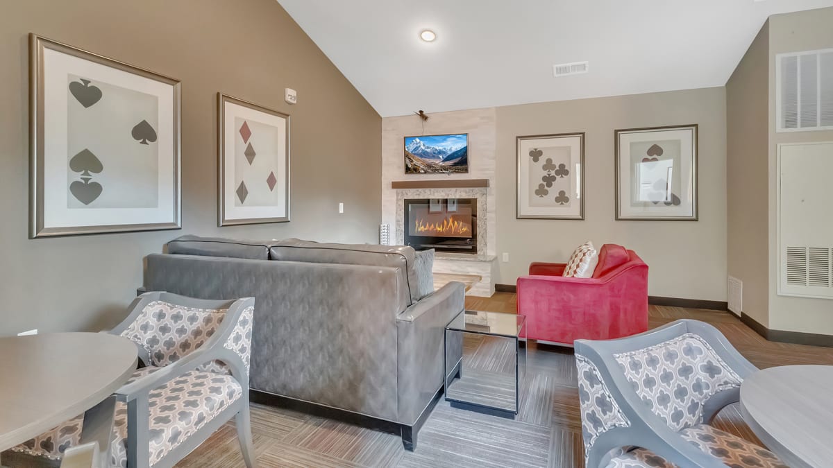 Monticello Crossings community room with fireplace seating - Monticello, MN