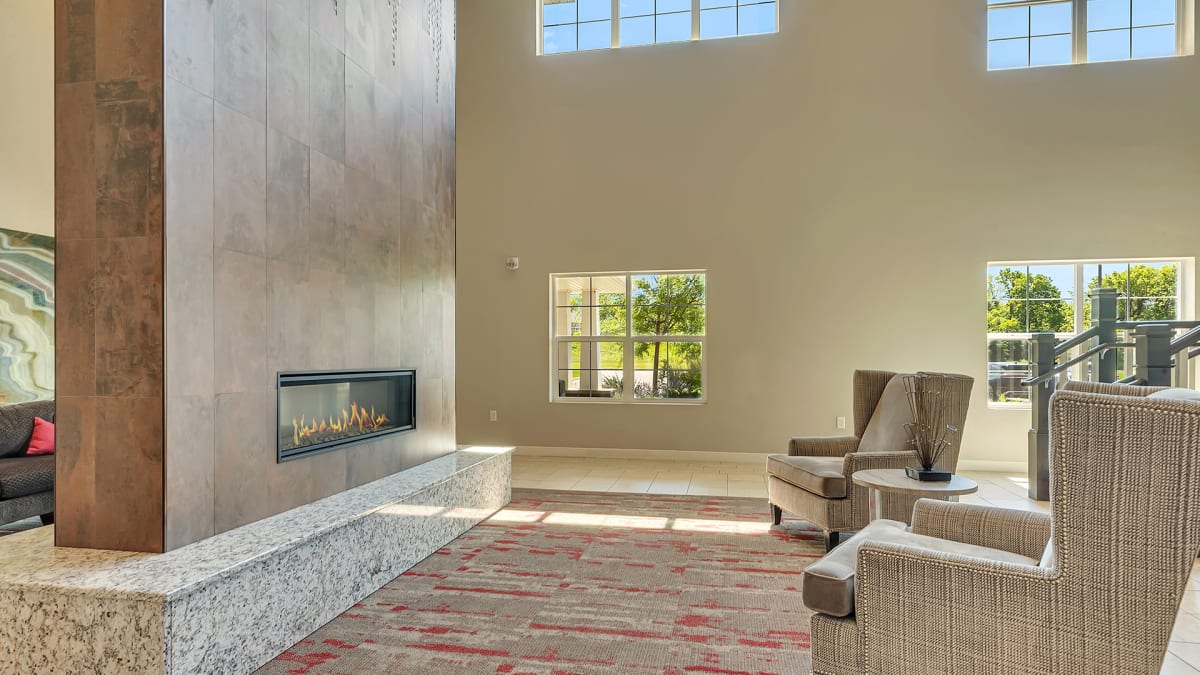 Monticello Crossings lounge with fireplace seating - Monticello, MN
