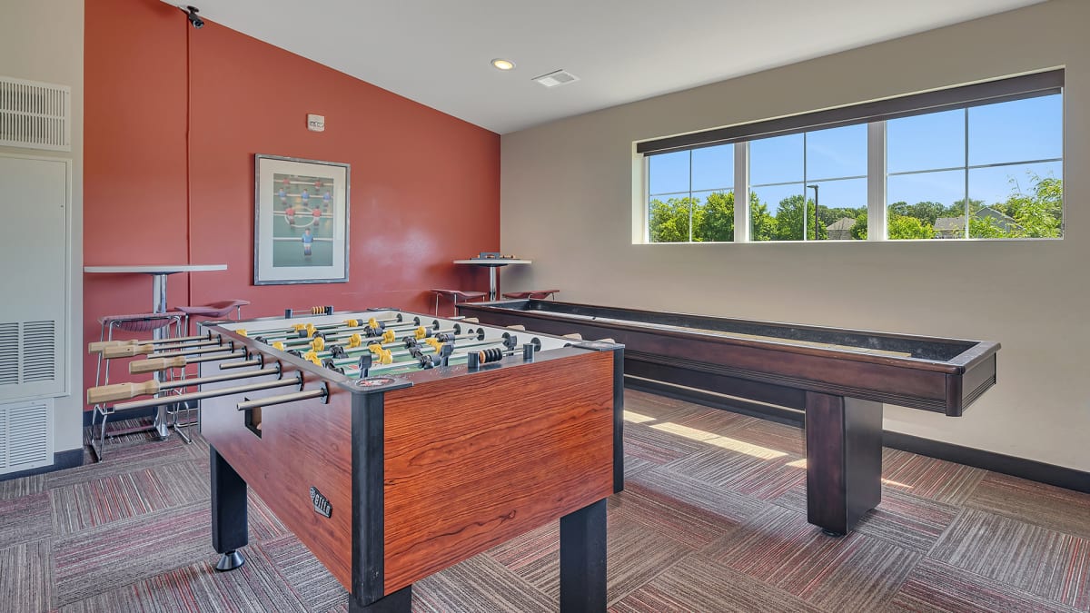 Monticello Crossings game room with foosball and bar area - Monticello, MN