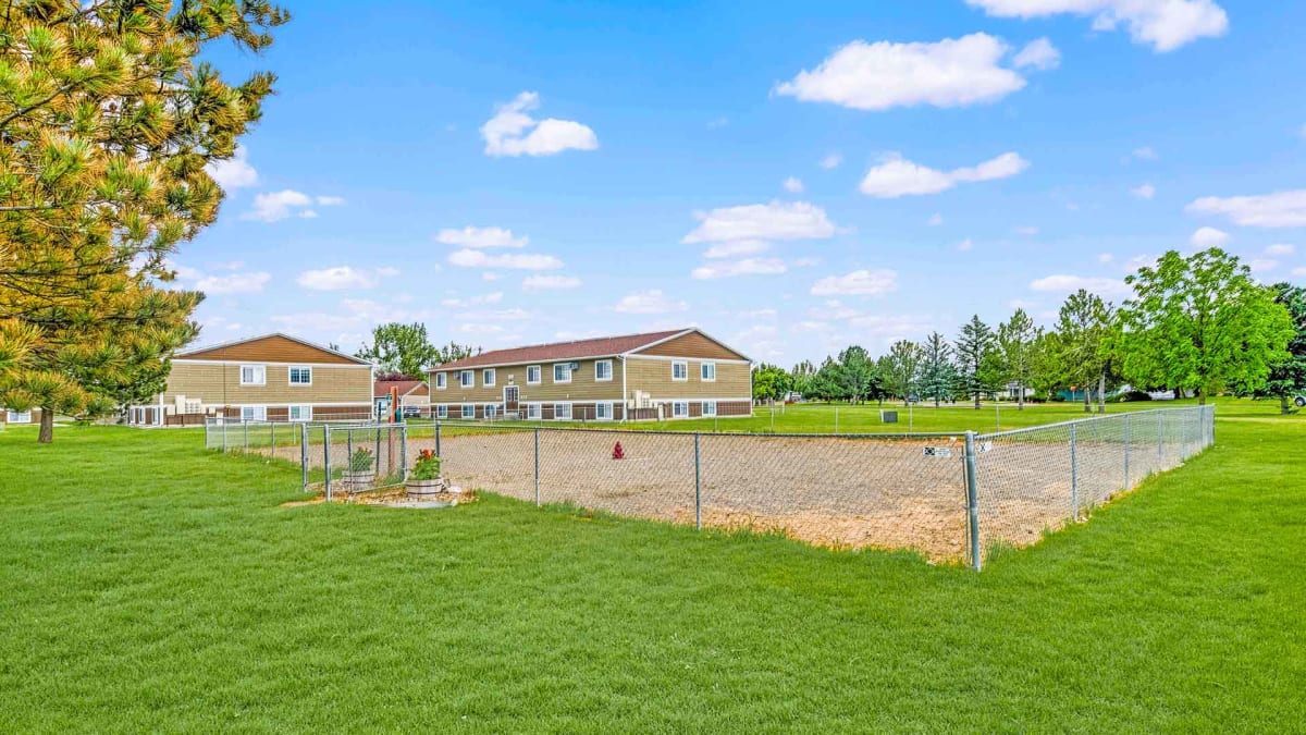 Olympic Village Apartments fenced dog park - Billings, MT