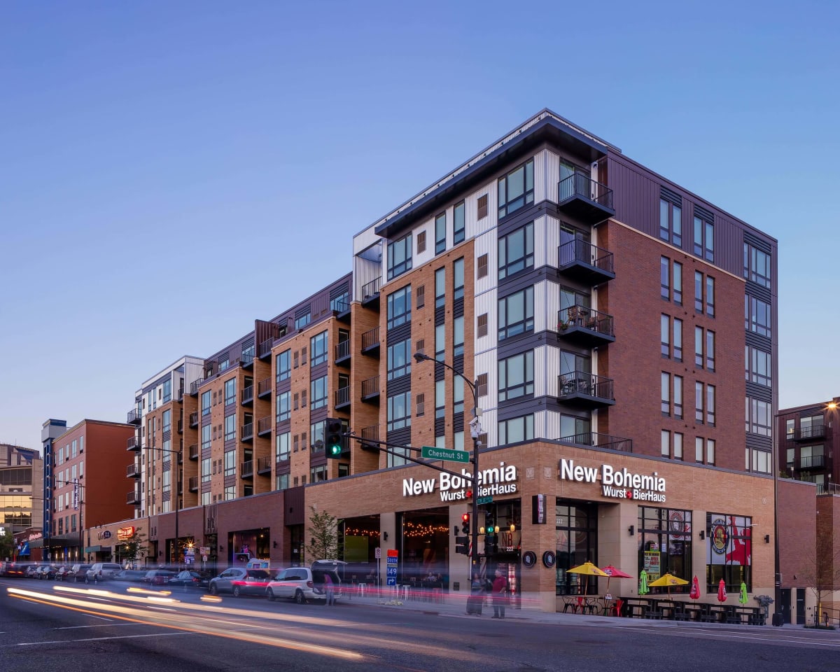 Oxbo Urban Rentals exterior with street-level retail - St. Paul, MN