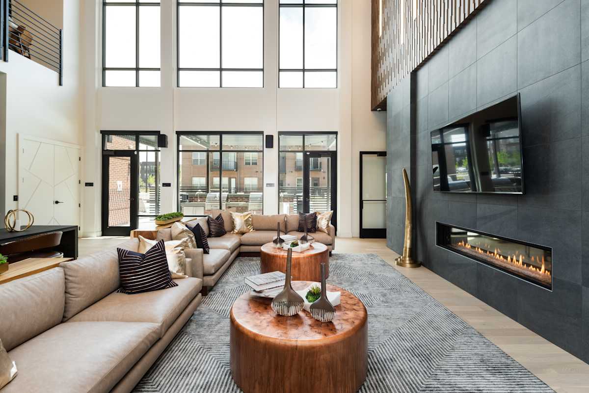 Railway Flats Apartments clubhouse fireplace lounge - Loveland, CO
