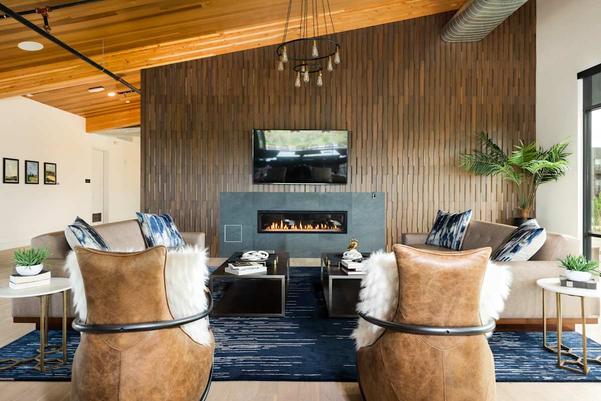 Railway Flats Apartments fireside lounge with TV - Loveland, CO