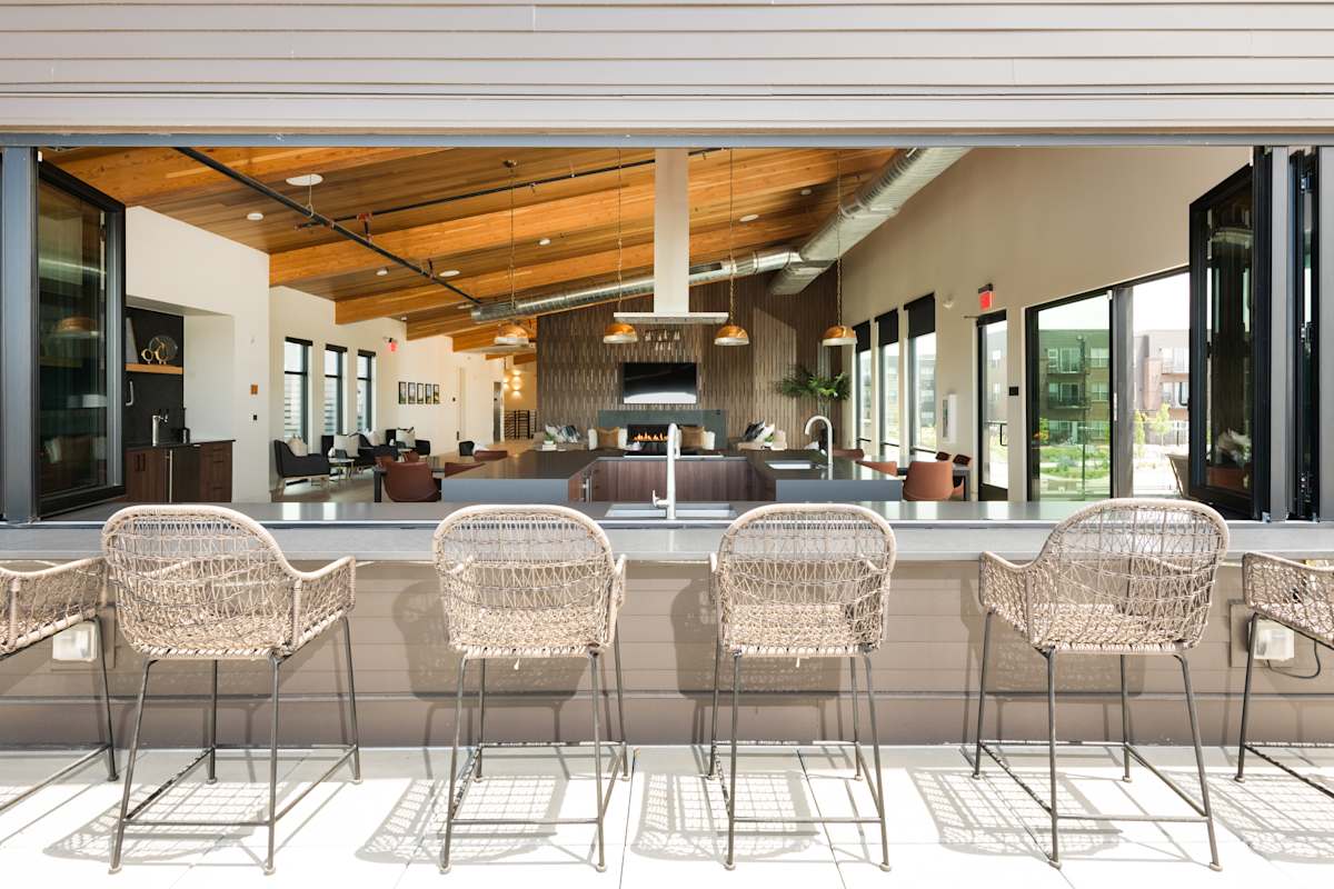 Railway Flats Apartments outdoor lounge near chef table - Loveland, CO