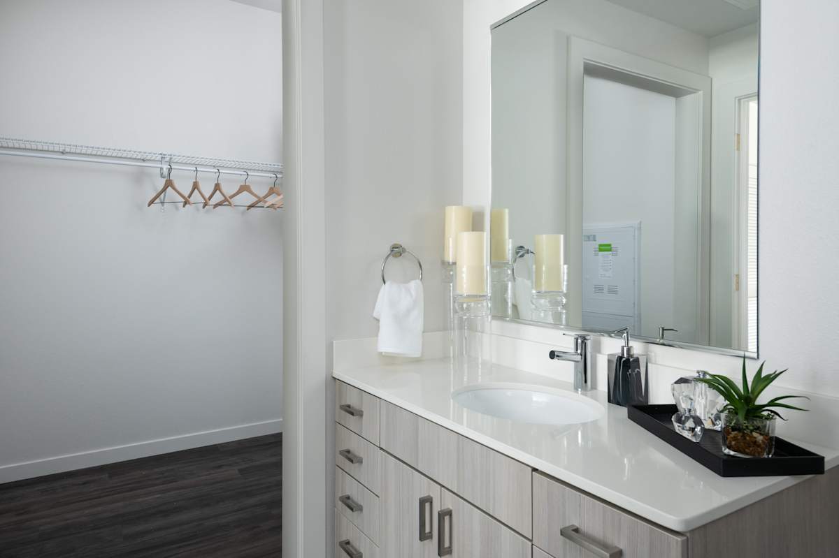 Railway Flats Apartments bathroom vanity and mirror - Loveland, CO