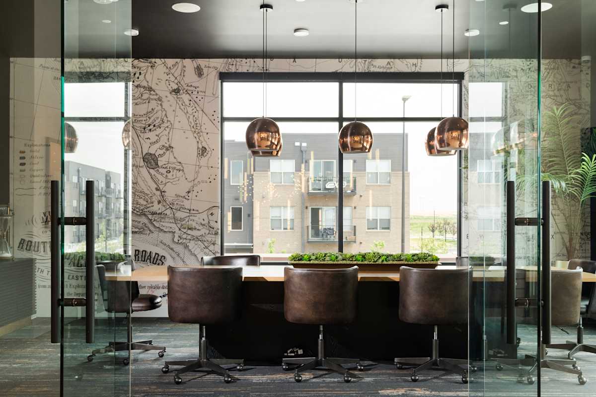 Railway Flats Apartments Synergy Space work area with WiFi and conference room - Loveland, CO