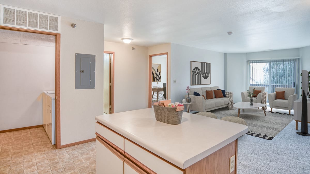 Rocky Meadows Apartments in-home laundry area near living space - Billings, MT