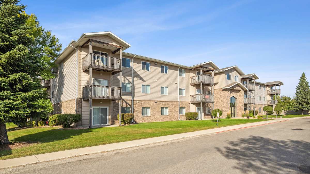 The Legacy Apartments exterior buildings with balconies - Grand Forks, ND