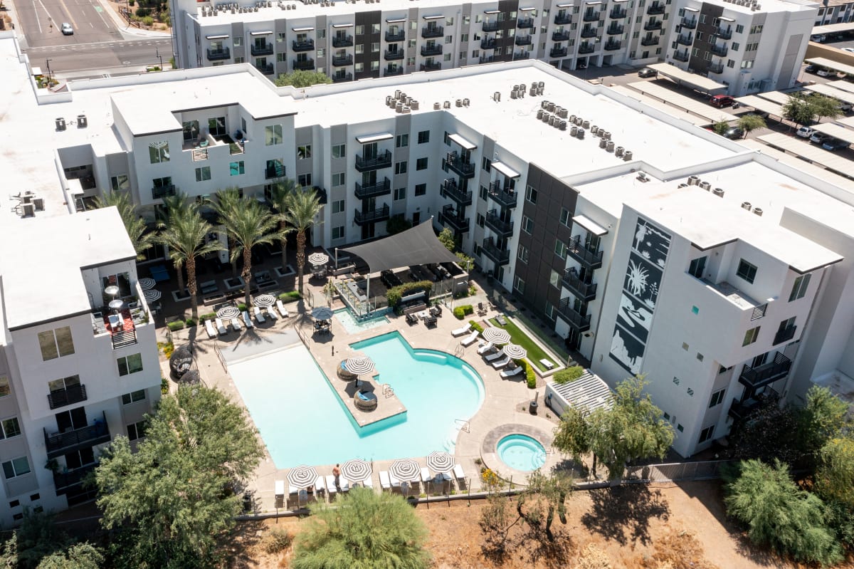 Aerial view of apartment buildings and pool at Slate Scottsdale.
