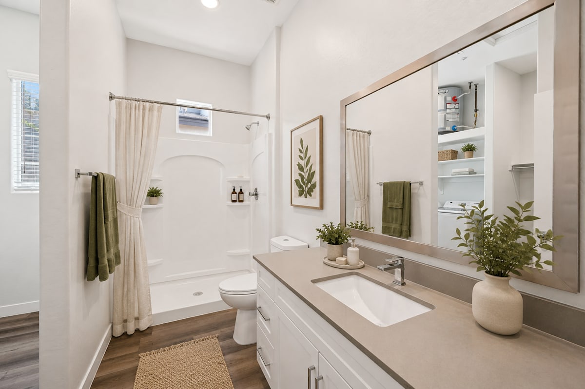 Apartment bathroom — representative home at Baseline on 16th.