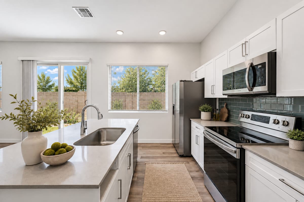 Apartment kitchen — representative home at Baseline on 16th.