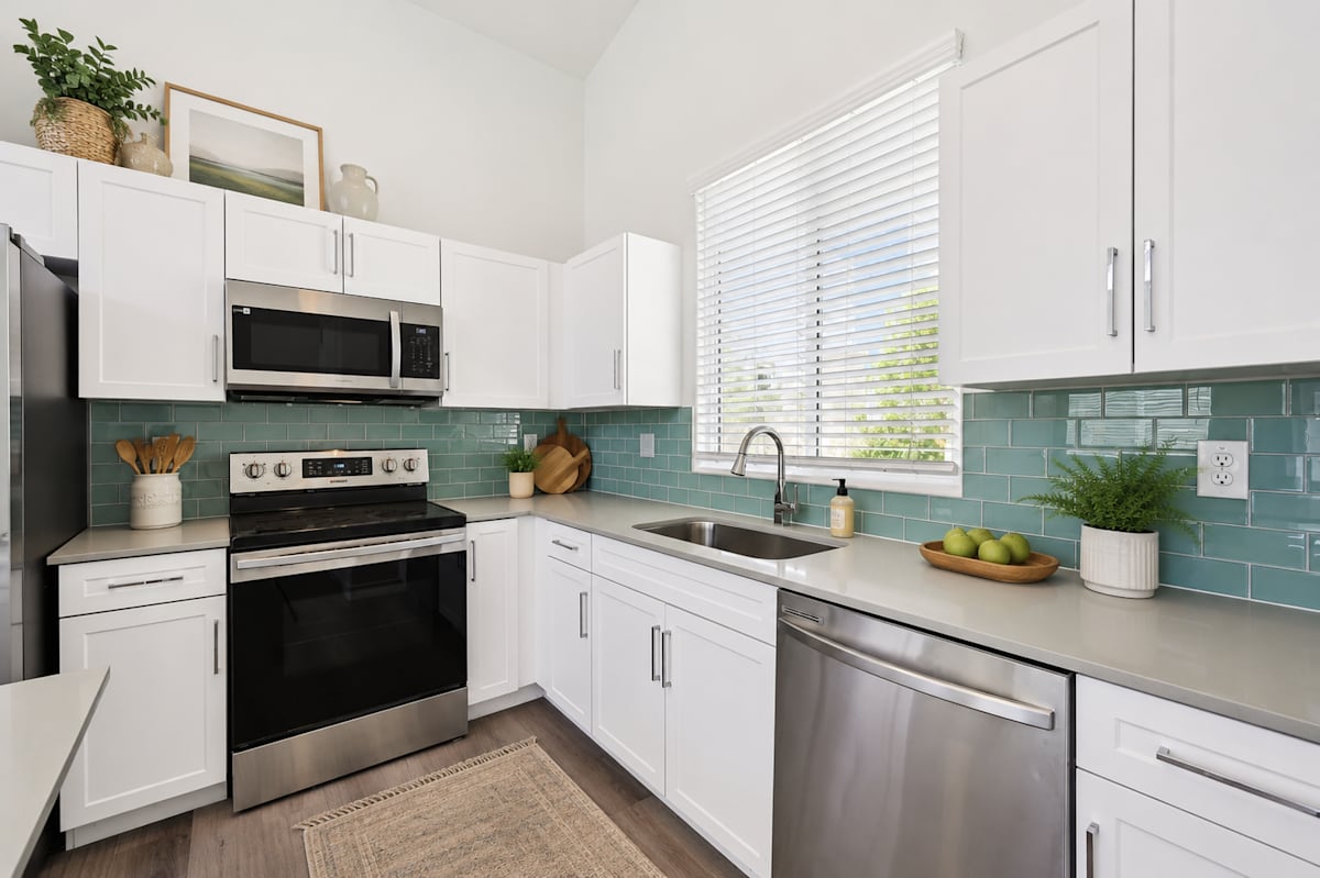 Apartment kitchen — representative home at Baseline on 16th.