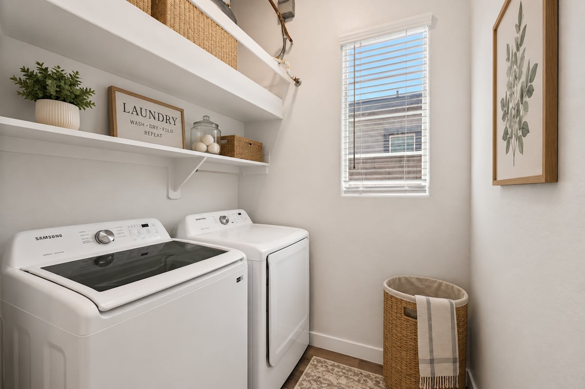 In-home laundry area — representative home at Baseline on 16th.