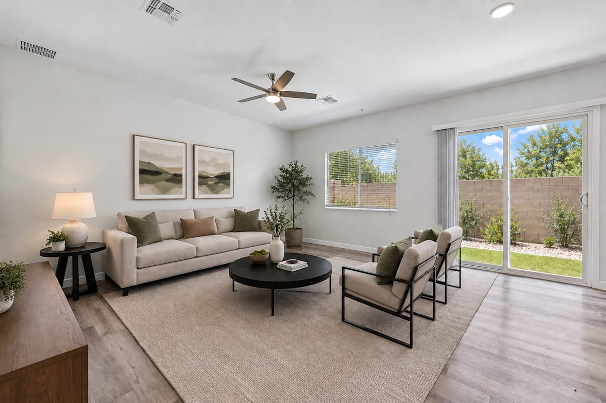 Furnished apartment living area shown — representative home at Baseline on 16th.