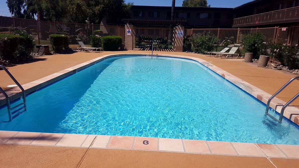 Pool and poolside area at Camelback Properties.