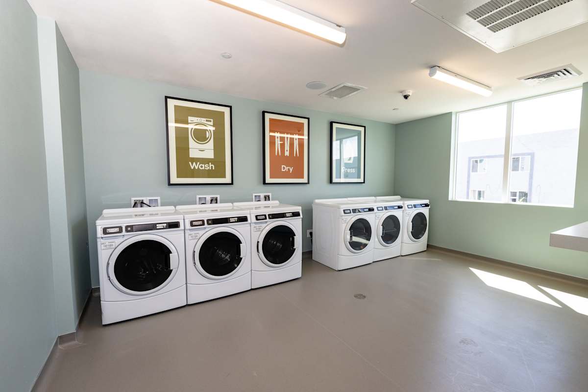 Shared laundry room at The Glendale Senior Apartments.