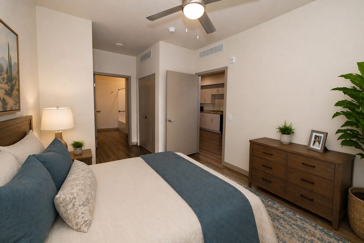 Furnished bedroom shown — representative home at The Glendale Senior Apartments.