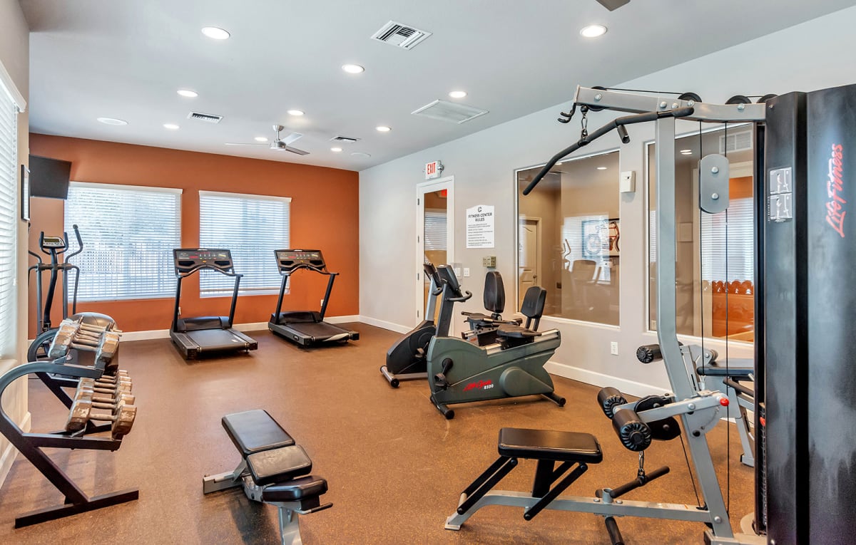 Fitness center with treadmills and strength equipment.