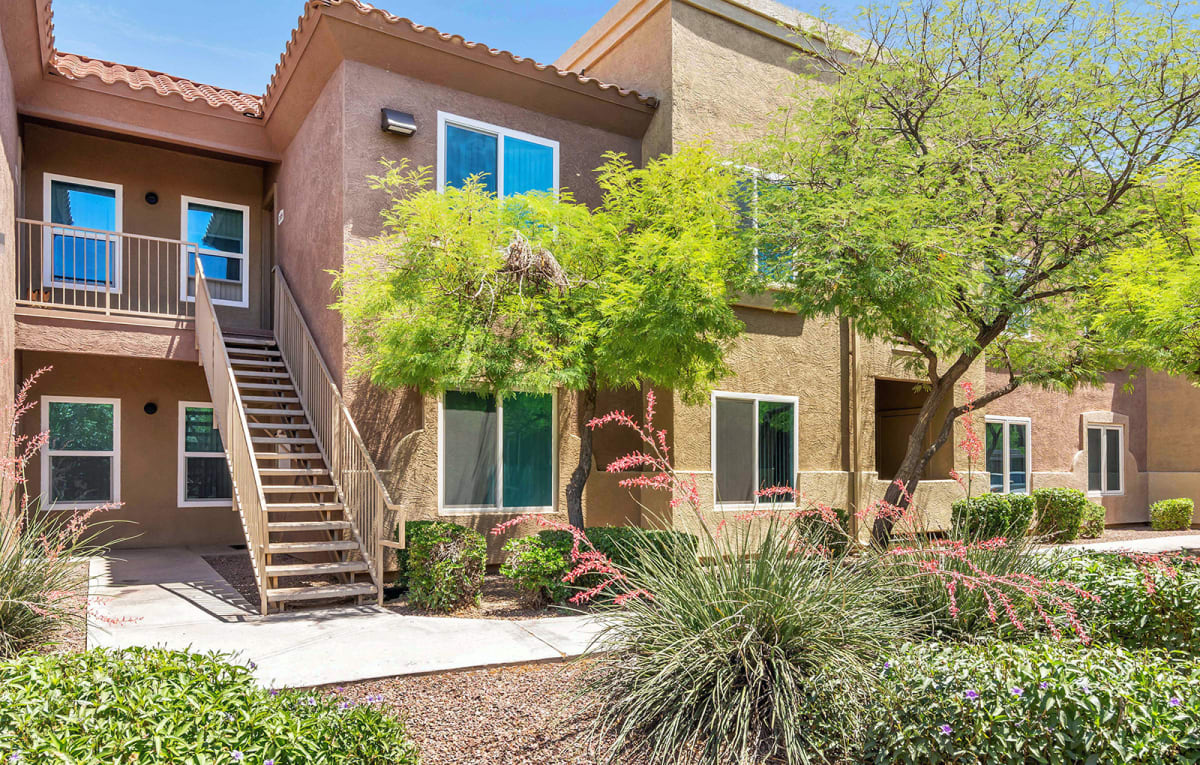 Exterior stairway and apartment entrance walkway.