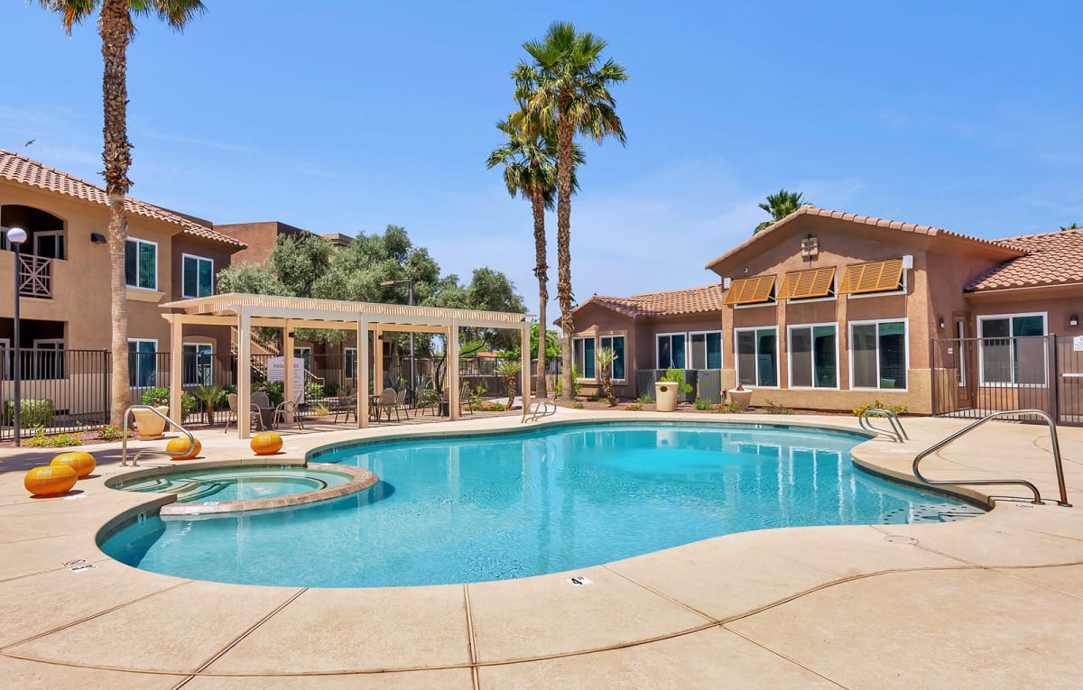 Pool beside the clubhouse and covered patio.