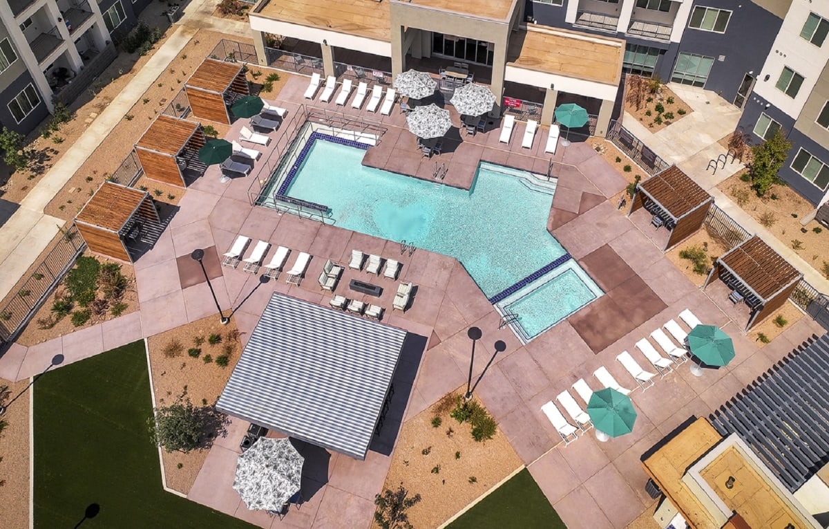 Pool and poolside area at Casa Azure 55+ Apartments.