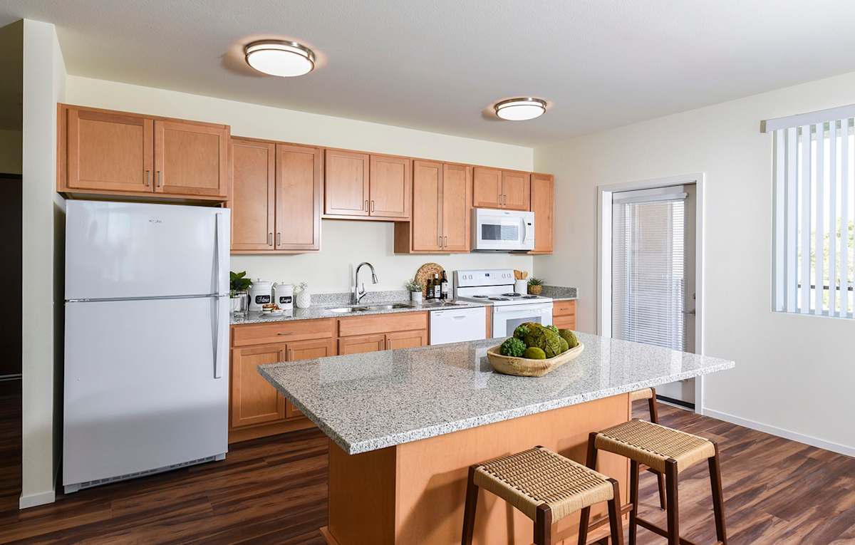 Suncrest Vista at Canyon Trails 55+ Apartments kitchen with granite countertops - Goodyear, AZ